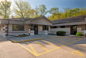 Exterior view of NorthLakes Community Clinic, Lakewood building and parking lot