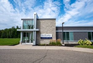 Exterior of modern clinic building with large glass windows